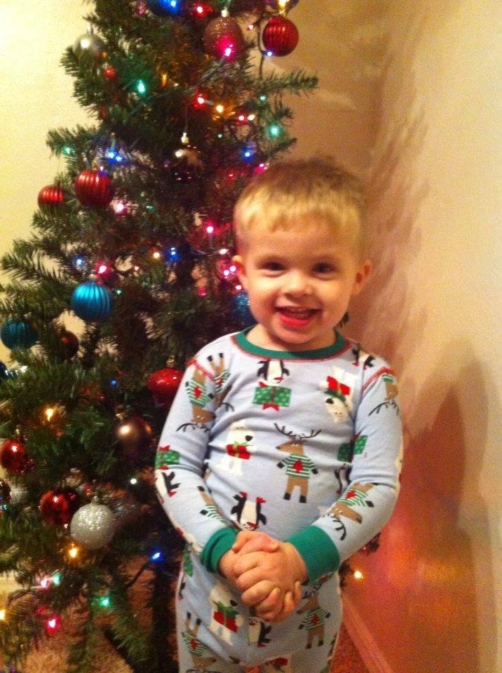Amber and Nathan put up a tree this yr. and took several pics to get this good one of Elliott in his Christmas jammies. I love this baby so much!