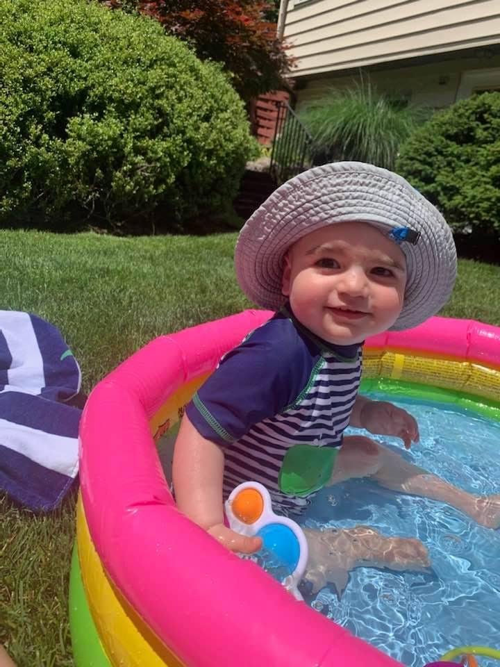 My little sweetheart❤️ enjoying his first experience in a pool today.