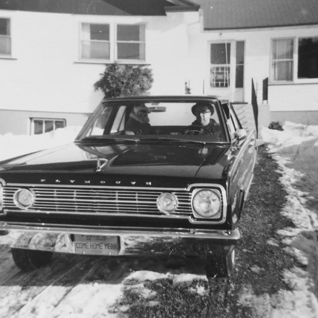 Going for a drive in the Plymouth.....No seat belts back then!
