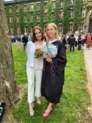 Dana and her sister, Kristen, getting together for a photo.