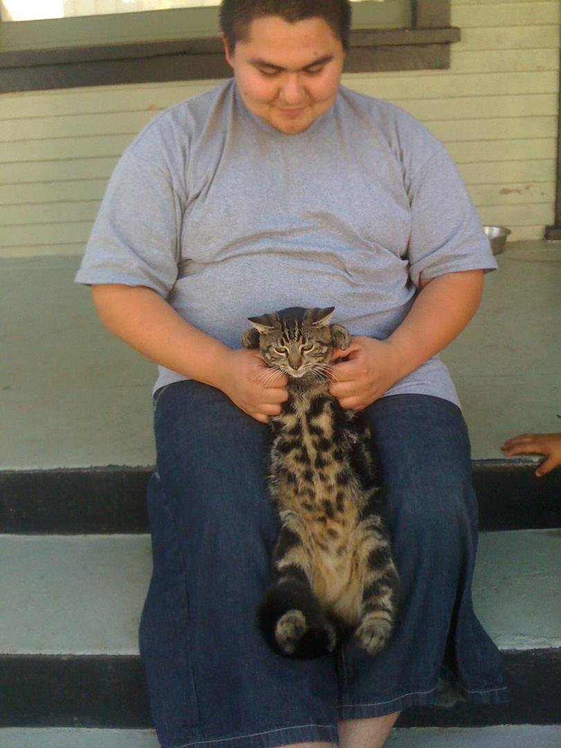 Sneaky was really really scared of Abel Jelly Gutierrez...he forced him in this picture to lay down...Sneaky was pretty mad...LOL