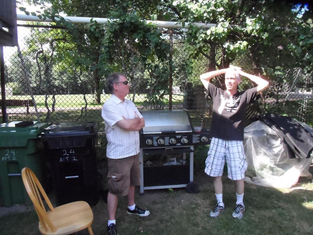 Thom and Jon in in Chuck,s backyard .