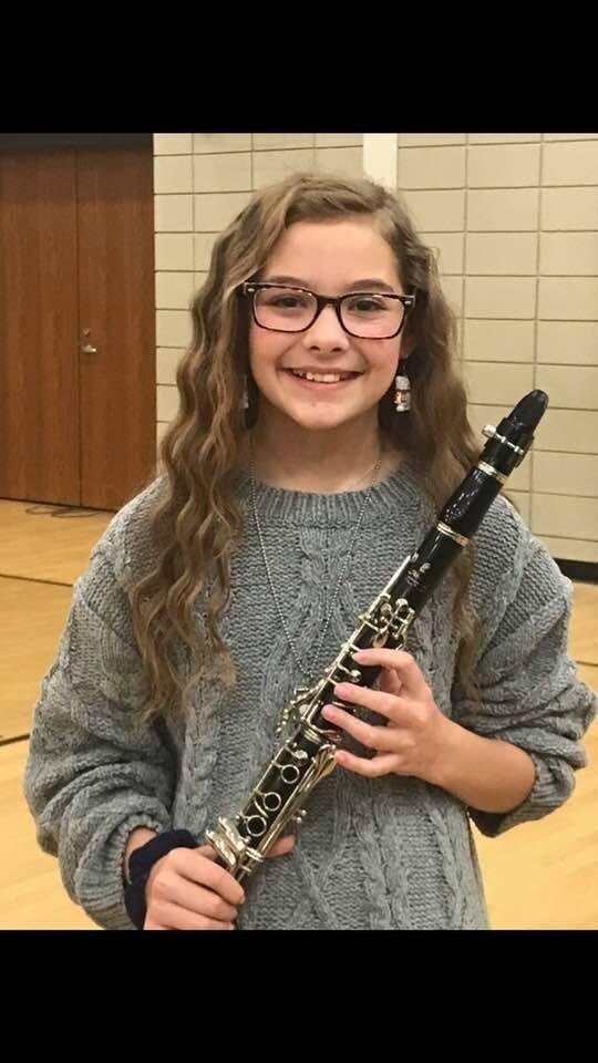 My granddaughter hadley rose. Her first band concert. It was amazing. Learned so much in just a few months. She loved it. Isn't she pretty!!!!!!!