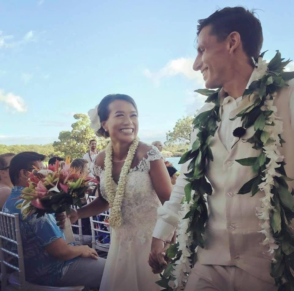 Daniel and Maricris Meyer walking up isle after wedding ceremony, Kona Hawaii May 18, 2019.