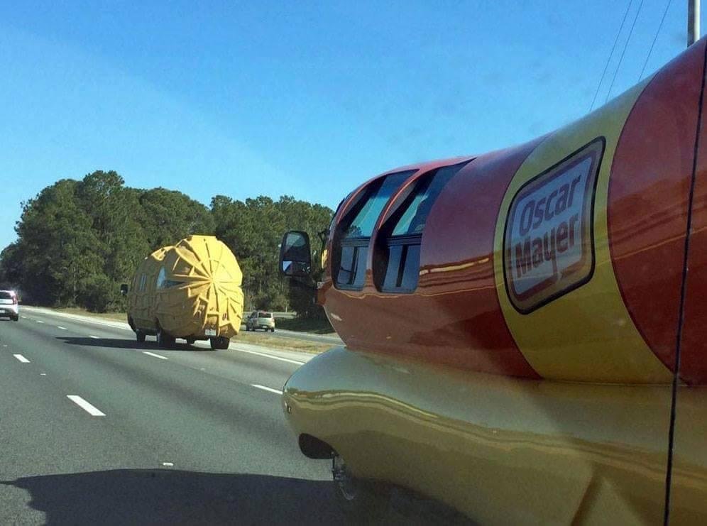 On their way to Daytona...the Oscar Mayer Wienermobile is inching ever closer to Mr. Peanut and his vehicle..this race is on!