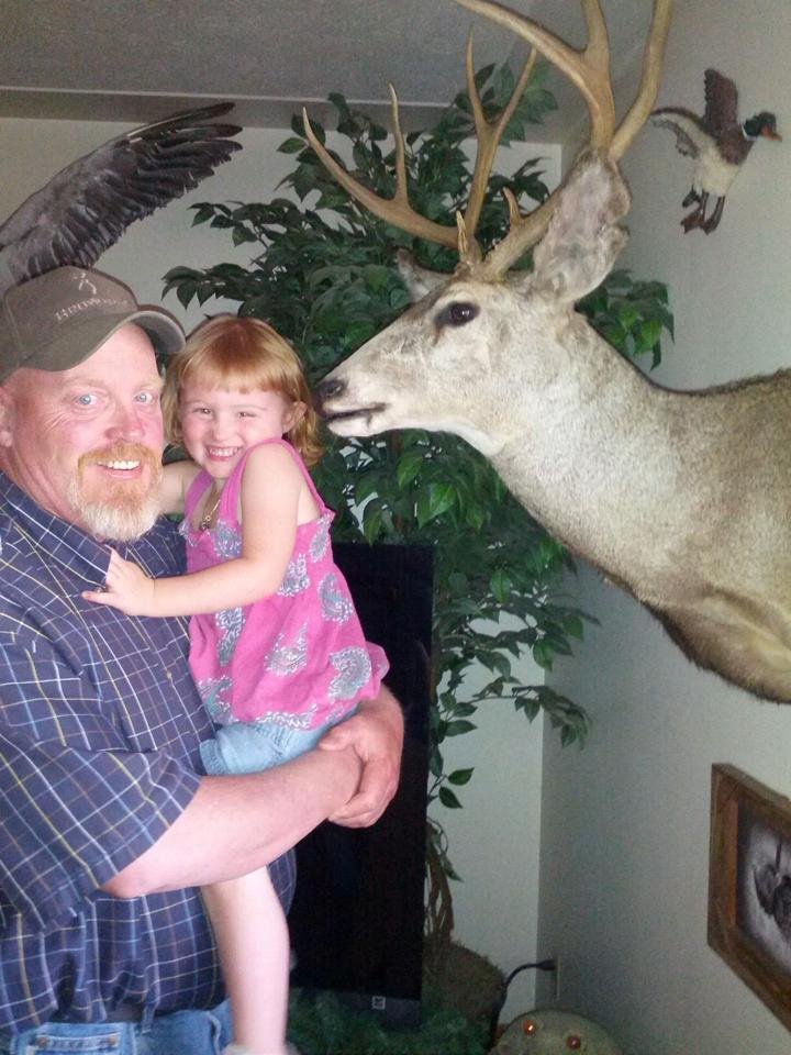 Me and my little Miss Baylee. She kissed the deer and didn't know what to think about that. Bless her little heart.