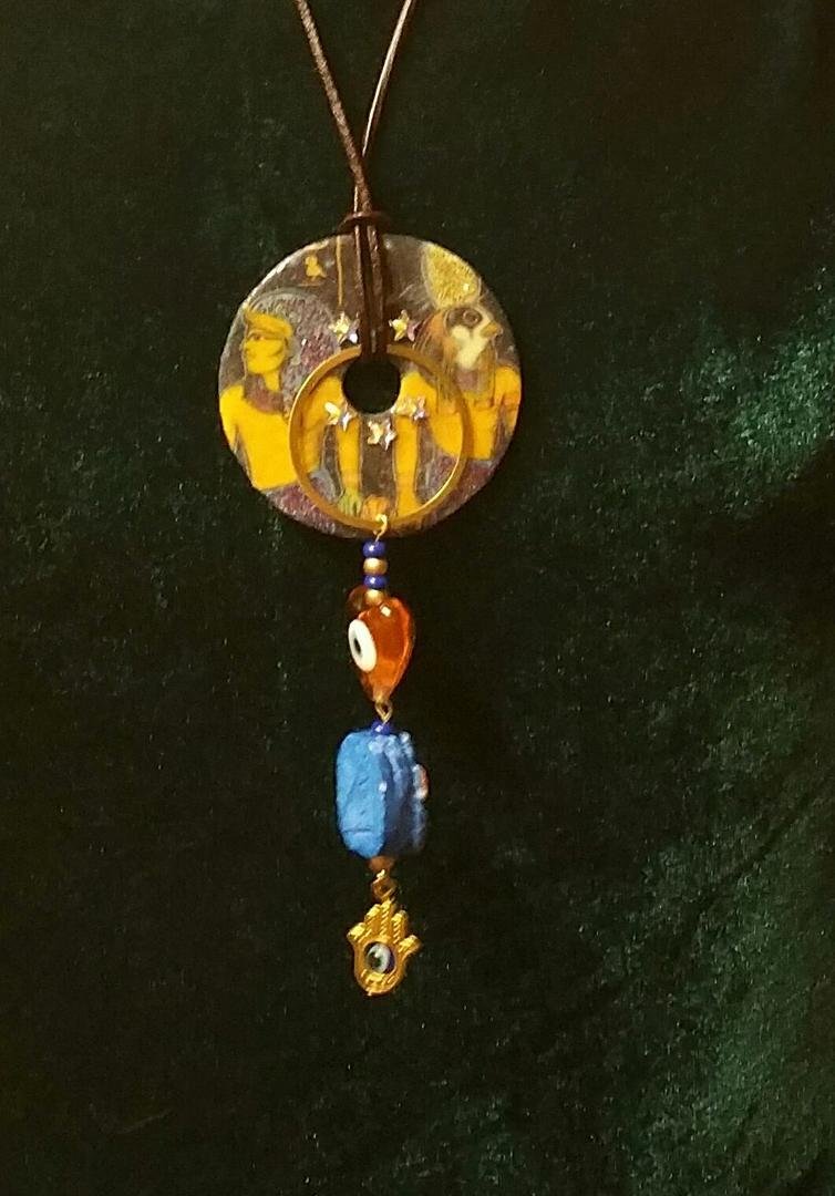 Amy traded a beautiful Christmas costume that she made for this Scaraboo necklace. Thanks!