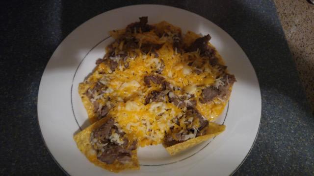 developing my fb skills.... thanks John Wilson for the inspiration :)
this is tonight's dinner... homemade fajita nachos! :)