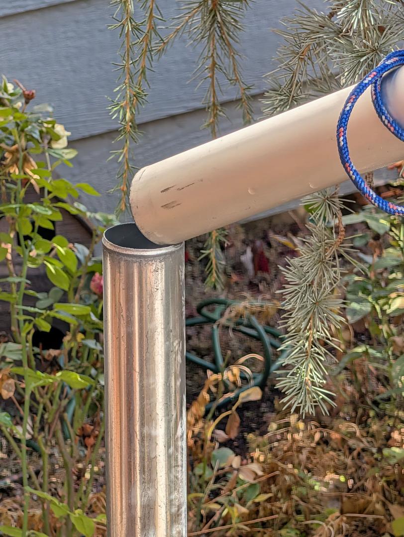 Apparently, we had some strong winds last night. This is our flagpole, separated from the base.