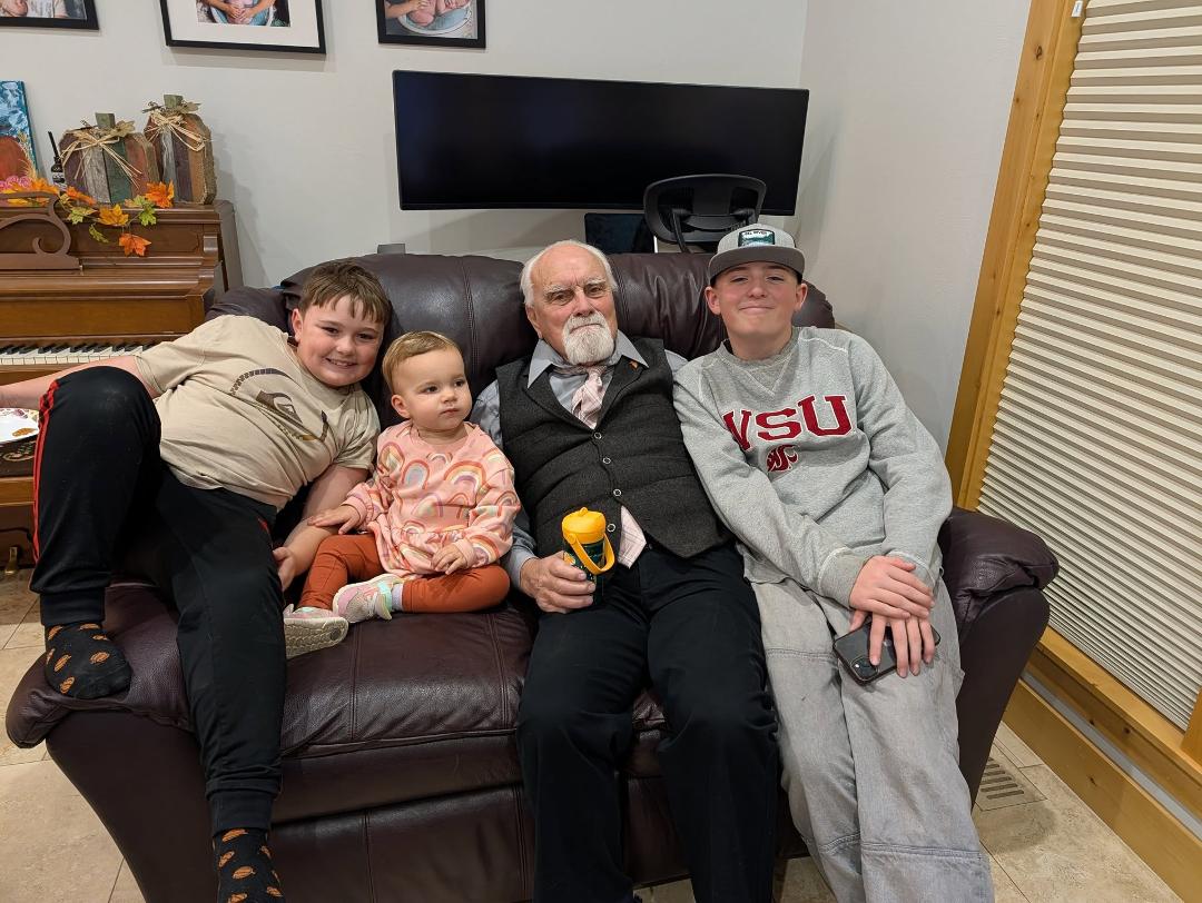 Poppy with three great-grandchildren.