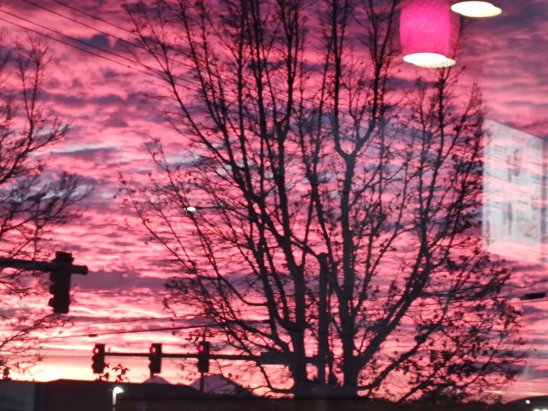 We were eating at Dairy Queen this evening and this is the sunset. The picture was taken from inside Dairy Queen. Redmond,Or.