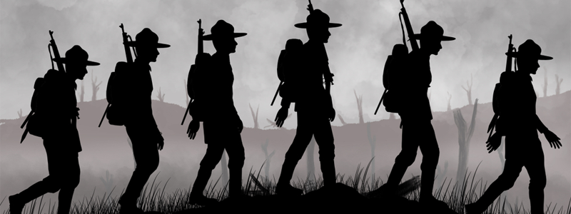 Silhouette of US soldiers on a world war one battlefield.