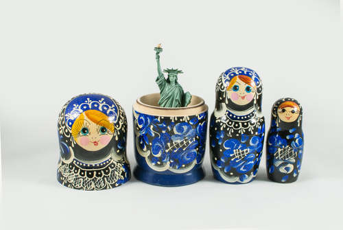 Statue of Liberty inside of Russian nesting doll. USA and Russia relations, cold war, conflict and influence conceptual background