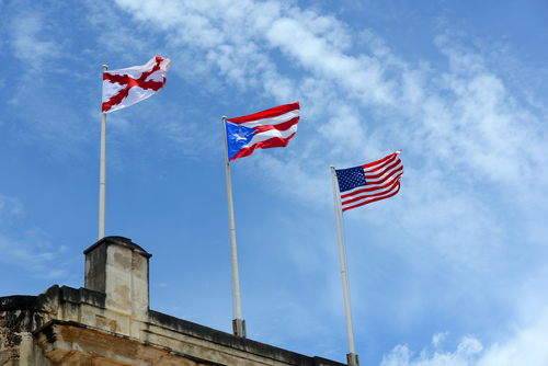 Flags fly at Castillo de San Cristóbal in San Juan, Puerto Rico.