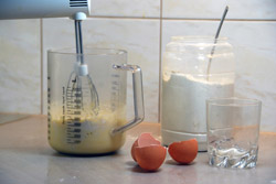 measuring and mixing pancake batter