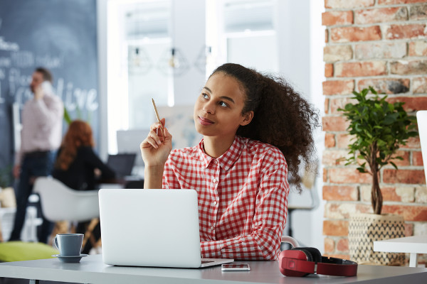 young woman thinking in classroom