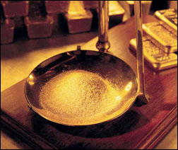 Gold dust being weighed