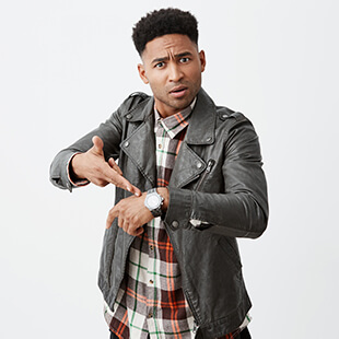 Man pointing at his watch.