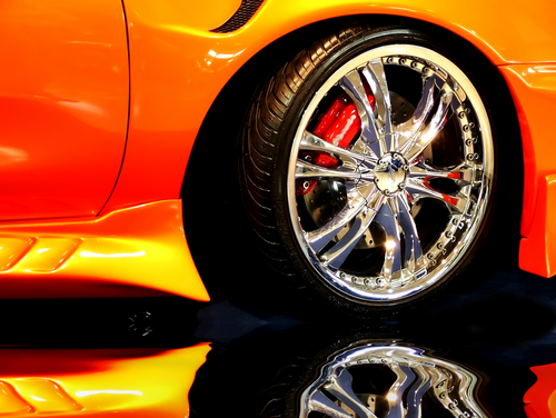 A car showing custom wheels