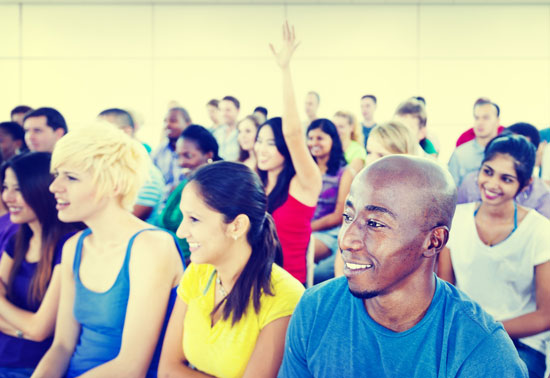 crowd listening to speech