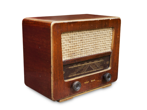 Old radio tuner isolated on white background