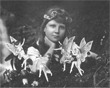 1917 photo of Frances Griffiths with the alleged fairies