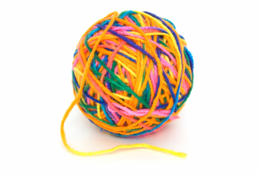 a multi-colored ball of yarn a multi-colored ball of yarn