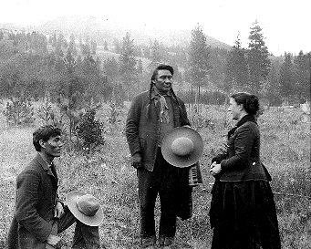 Alice Cunningham Fletcher and Chief Joseph at the Nez Percé Lapwai Reservation in Idaho, where Fletcher arrived in 1889 to implement the Dawes Act. The man on one knee is James Stuart, Alice Fletcher's interpreter.