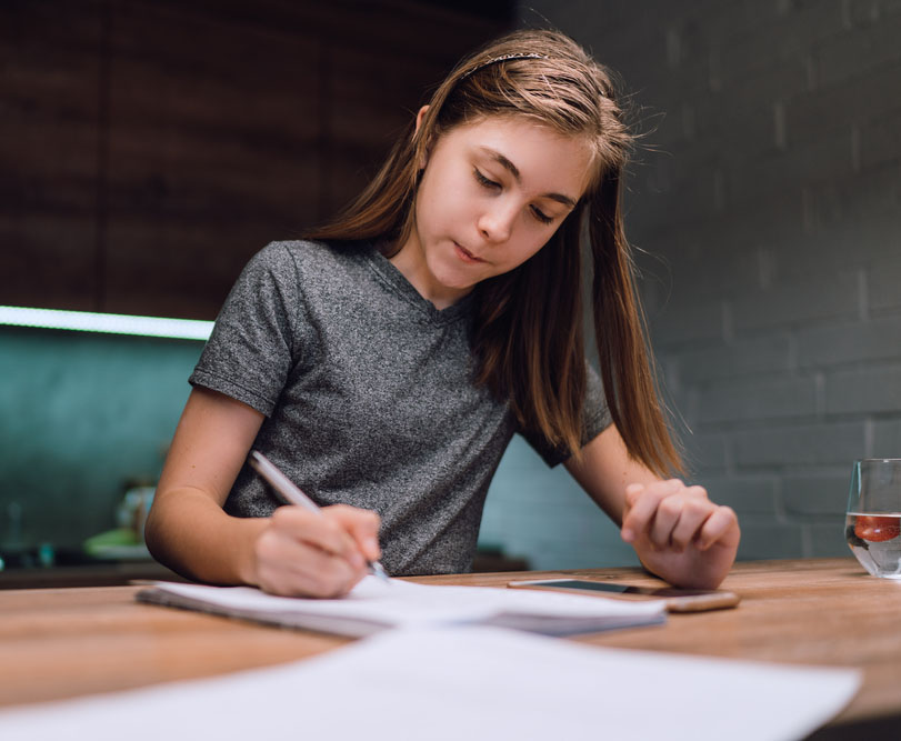 Girl studying at home.