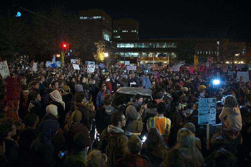 By Fibonacci Blue from Minnesota, USA (Protest against Donald Trump) [CC BY 2.0 (http://creativecommons.org/licenses/by/2.0)], via Wikimedia Commons