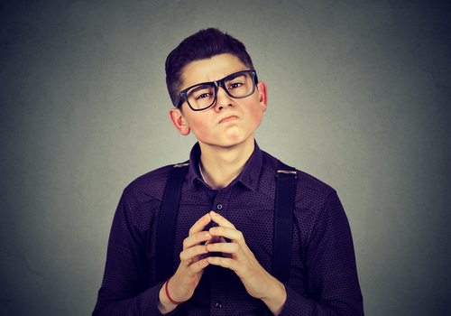 Young man with snobbish face expression