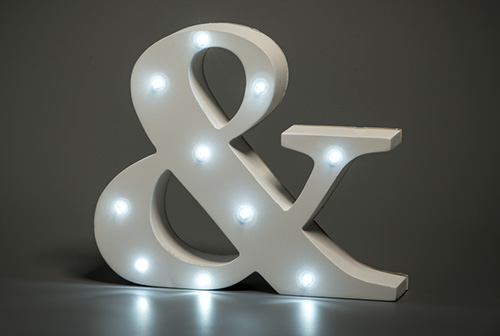 an ampersand symbol decorated with lights