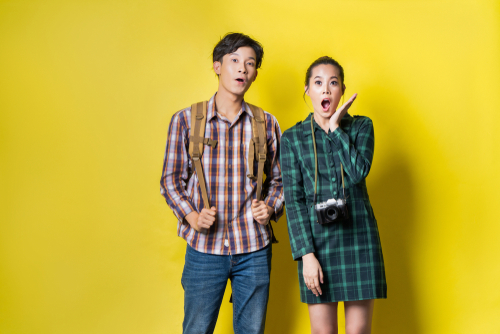 A young boy and girl looking surprised. Use enter key to open full-screen view.
