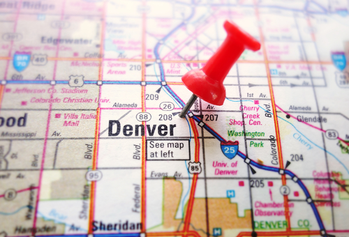 Closeup of a map of Denver with red push pin