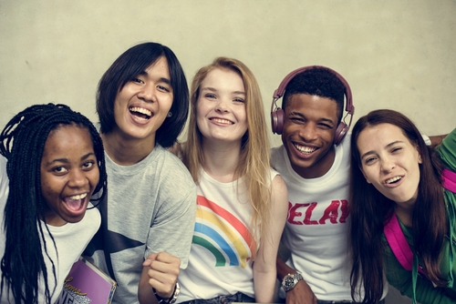 A group of multicultural friends. Use enter key to open full-screen view.