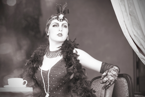 A woman dressed in the flapper style of the 1920s