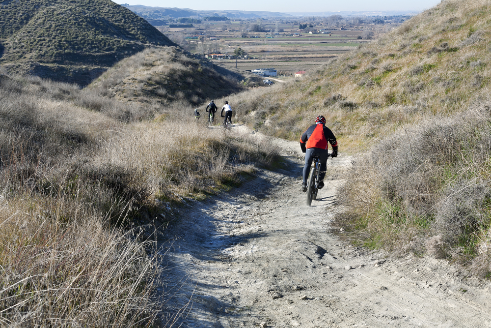 People mountain biking in Los Juncales, Spain.