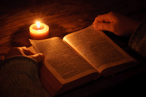 reading by candlelight