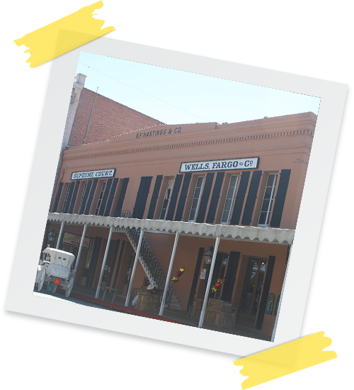 B.F. Hastings Bank Building photograph with tape holding it up.