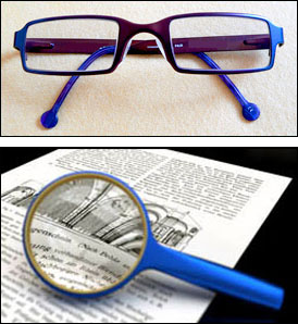 glasses and magnifying glass