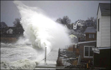 Storm hitting the shore with a huge wave