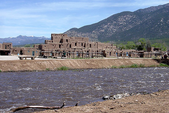 Taos Pueblo with Rio Pueblo in foreground.