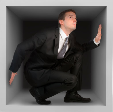 man trapped in a box