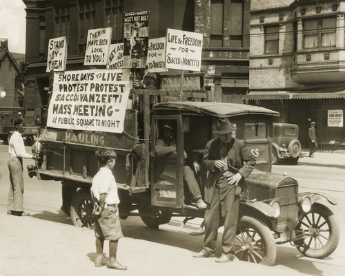 A truck with several protest signs five days prior to the executions of Sacco and Vanzetti