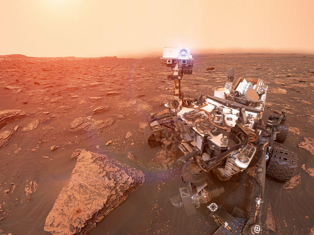 Martian rover Curiosity on the surface of planet Mars.