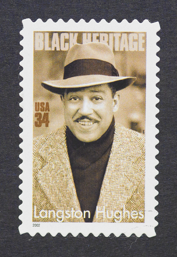 A postage stamp showing an image of poet Langston Hughes
