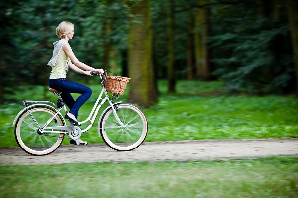 a woman riding a bike