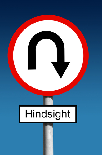 Round road traffic Hindsight sign with curved arrow business planning concept