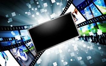 a screen with film strips running behind it