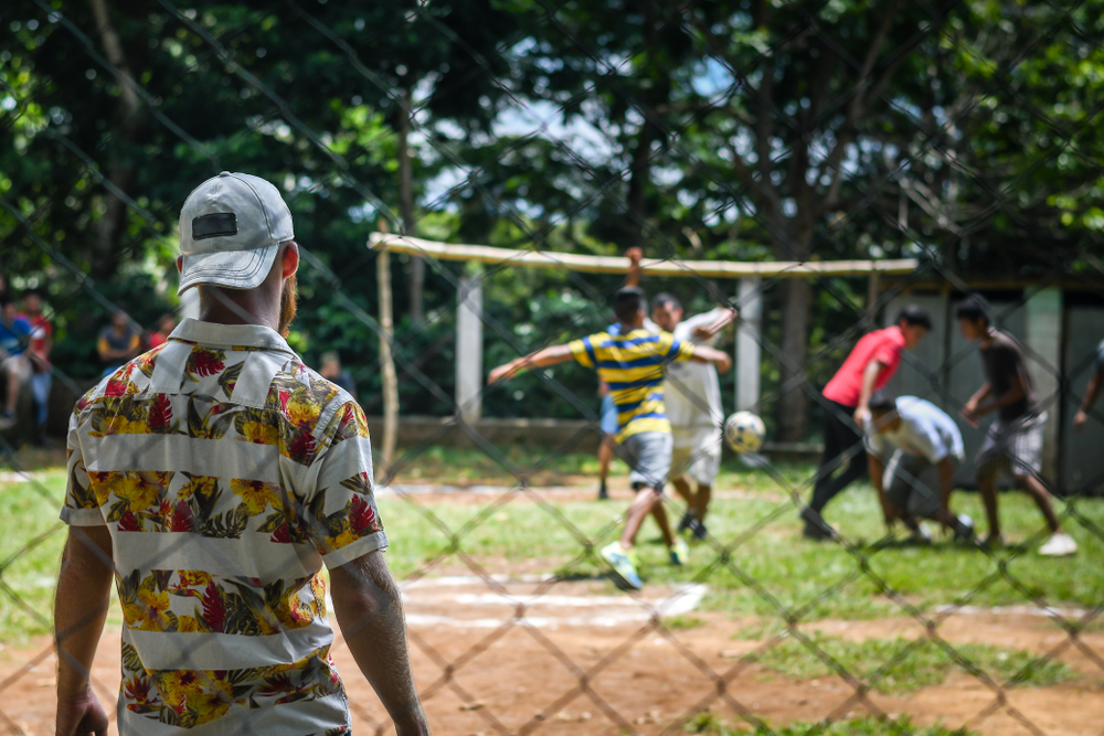 People playing soccer in a Guatemalan village.